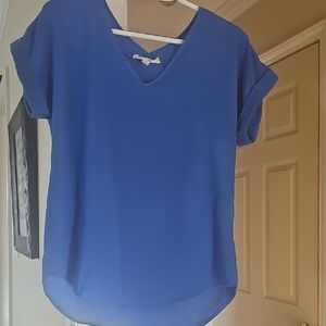 Blue short sleeve relaxed blouse with asymmetrical style